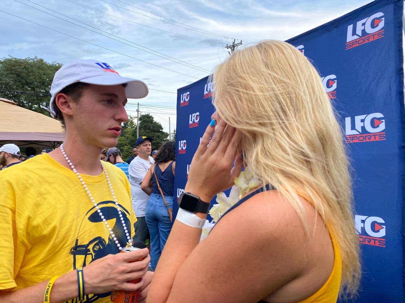 an interview in front of the lfg backdrop in ann arbor