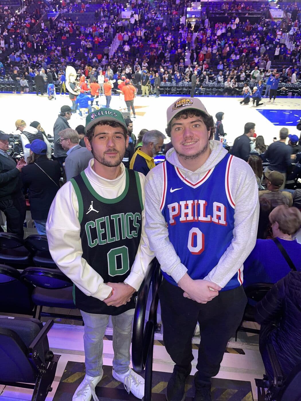 sixers and celtics fans courtside