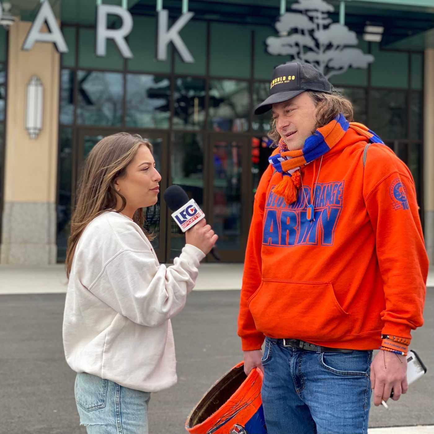 a member of the blue and orange army on the lfg mic